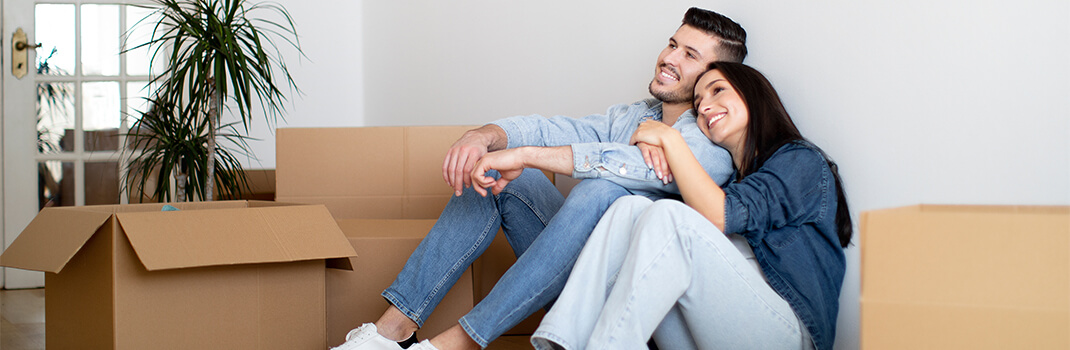 Couple with moving boxes